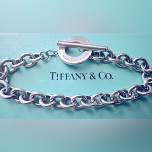 Tiffany & Co rollo link charm bracelet. 925 - 7 ¼”.